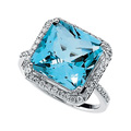 Ring Featuring a Fantasy Cut Swiss Blue Topaz encompassed by Diamonds